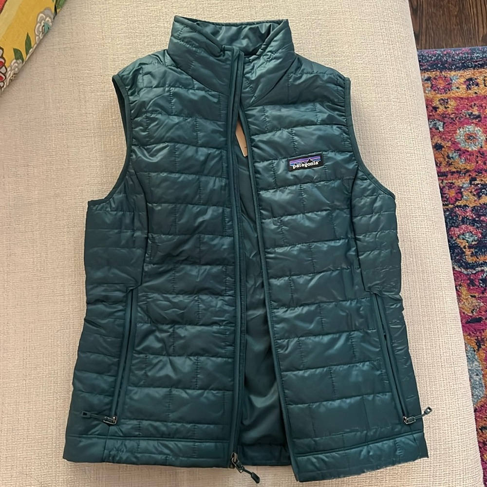 Brand new never worn. Green/blue Patagonia vest. Women’s small